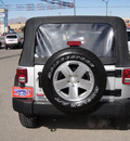 jeep wrangler unlimited 2010 silver suv sport gasoline 6 cylinders 4 wheel drive automatic 79936