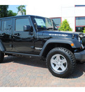 jeep wrangler unlimited 2012 black suv rubicon gasoline 6 cylinders 4 wheel drive automatic 77017