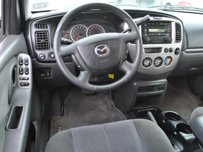 mazda tribute 2004 tan suv lx v6 gasoline 6 cylinders front wheel drive automatic with overdrive 78550