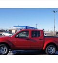 nissan frontier 2008 red se v6 gasoline 6 cylinders 4 wheel drive automatic with overdrive 79109