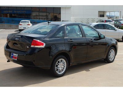ford focus 2010 black sedan se gasoline 4 cylinders front wheel drive automatic with overdrive 77034