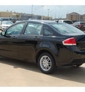 ford focus 2010 black sedan se gasoline 4 cylinders front wheel drive automatic with overdrive 77034