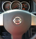 nissan versa 2012 black hatchback 1 8 s gasoline 4 cylinders front wheel drive 6 speed manual 75150