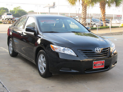 toyota camry 2009 black sedan le gasoline 4 cylinders front wheel drive automatic with overdrive 77074