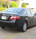 toyota camry 2009 black sedan le gasoline 4 cylinders front wheel drive automatic with overdrive 77074