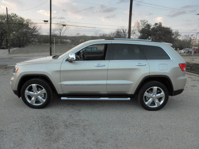 jeep grand cherokee 2012 gold suv overland summit gasoline 8 cylinders 2 wheel drive automatic 78028