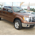 ford f 150 2011 brown xlt flex fuel 8 cylinders 2 wheel drive automatic with overdrive 77657