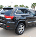 jeep grand cherokee 2012 black suv overland gasoline 8 cylinders 2 wheel drive 6 speed automatic 77450