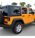 jeep wrangler unlimited 2012 dozer suv sport gasoline 6 cylinders 4 wheel drive 6 speed manual 77450