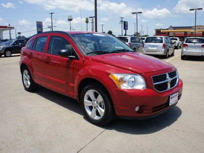 dodge caliber 2011 maroon hatchback mainstreet gasoline 4 cylinders front wheel drive automatic 75110