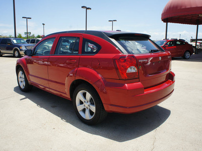 dodge caliber 2011 maroon hatchback mainstreet gasoline 4 cylinders front wheel drive automatic 75110