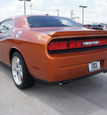 dodge challenger 2011 orange coupe r t classic gasoline 8 cylinders rear wheel drive automatic 76011