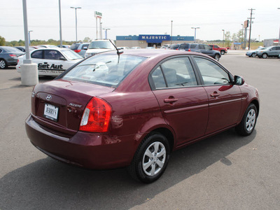 hyundai accent 2010 red sedan gasoline 4 cylinders front wheel drive automatic with overdrive 76087