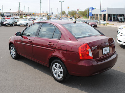 hyundai accent 2010 red sedan gasoline 4 cylinders front wheel drive automatic with overdrive 76087