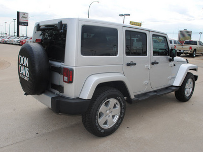 jeep wrangler 2012 silver suv unlimited sahara gasoline 6 cylinders 4 wheel drive automatic 76011