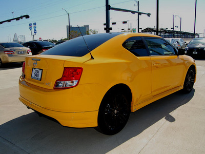 scion tc 2012 yellow coupe relese series gasoline 4 cylinders front wheel drive 6 speed manual 76011