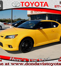 scion tc 2012 yellow coupe relese series gasoline 4 cylinders front wheel drive 6 speed manual 76011