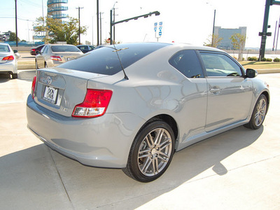 scion tc 2012 gray coupe gasoline 4 cylinders front wheel drive 6 speed manual 76011