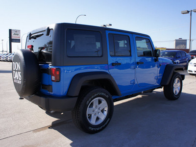 jeep wrangler unlimited 2012 blue suv sport gasoline 6 cylinders 4 wheel drive automatic 76011