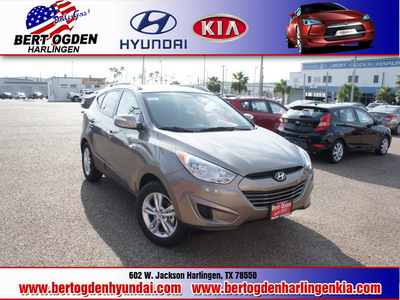 hyundai tucson 2012 brown gls gasoline 4 cylinders front wheel drive automatic 78550