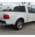 ford f 150 2002 white lariat gasoline 8 cylinders rear wheel drive automatic with overdrive 77020