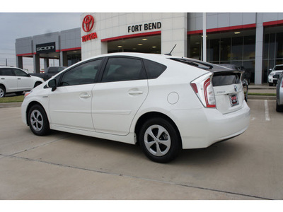 toyota prius 2012 white hatchback three hybrid 4 cylinders front wheel drive automatic 77469