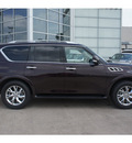 infiniti qx56 2011 brown suv gasoline 8 cylinders 4 wheel drive shiftable automatic 77074