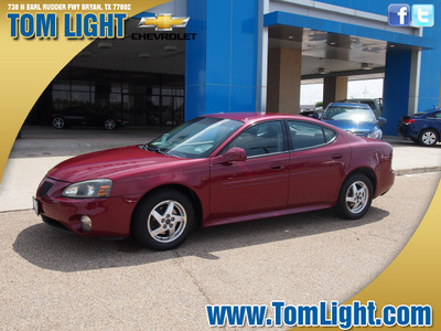 pontiac grand prix 2004 red sedan gt1 gasoline 6 cylinders front wheel drive 4 speed automatic 77802
