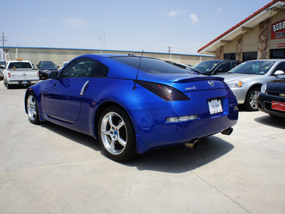 nissan 350z 2005 blue coupe touring gasoline 6 cylinders rear wheel drive 6 speed manual 79110