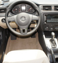 volkswagen jetta 2012 brown sedan se gasoline 5 cylinders front wheel drive automatic 76053
