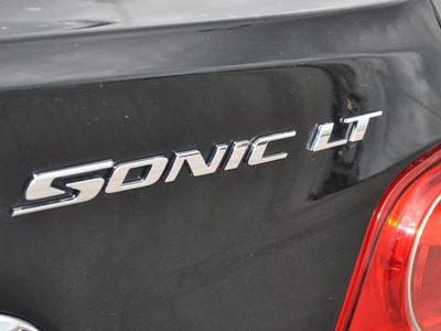 chevrolet sonic 2012 black sedan lt gasoline 4 cylinders front wheel drive 6 speed automatic 75067