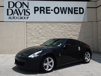 nissan 370z 2011 black coupe gasoline 6 cylinders rear wheel drive 6 speed manual 76011