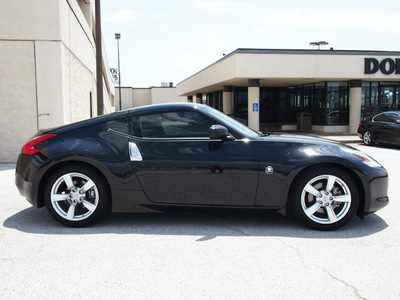 nissan 370z 2011 black coupe gasoline 6 cylinders rear wheel drive 6 speed manual 76011