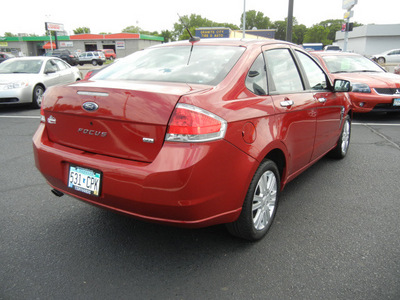 ford focus 2009 red sedan sel gasoline 4 cylinders front wheel drive automatic 56301