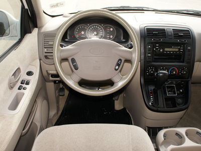 kia sedona 2004 white van lx gasoline 6 cylinders front wheel drive automatic with overdrive 76087