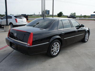 cadillac dts 2006 black sedan gasoline 8 cylinders front wheel drive automatic 76087