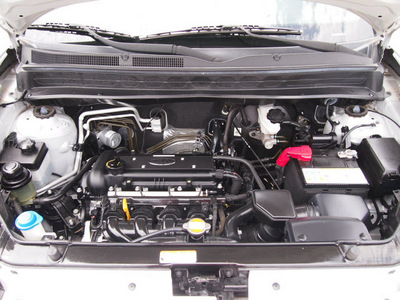 kia soul 2010 silver hatchback gasoline 4 cylinders front wheel drive 5 speed manual 76018