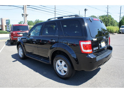 ford escape 2009 black suv xlt gasoline 6 cylinders 4 wheel drive automatic with overdrive 08902