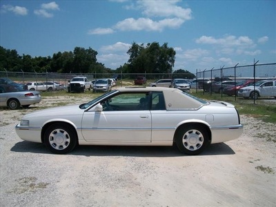 cadillac eldorado 1996 wht coupe gasoline 8 cylinders front wheel drive not specified 34731