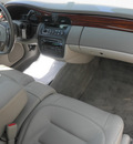 cadillac deville 2003 red sedan tan gasoline 8 cylinders dohc front wheel drive automatic with overdrive 34731