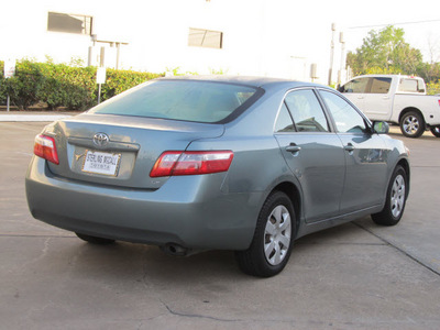 toyota camry 2009 green sedan le gasoline 4 cylinders front wheel drive automatic with overdrive 77074