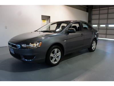 mitsubishi lancer 2009 gray sedan es gasoline 4 cylinders front wheel drive not specified 77471