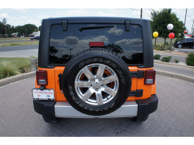 jeep wrangler 2012 orange suv sahara gasoline 6 cylinders 4 wheel drive automatic 78006