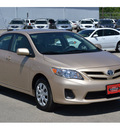 toyota corolla 2011 tan sedan le gasoline 4 cylinders front wheel drive automatic 76801