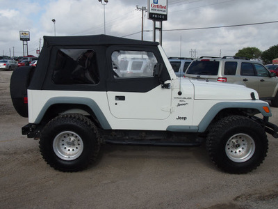 jeep wrangler 1999 white suv sport gasoline 6 cylinders 4 wheel drive 5 speed manual 78064