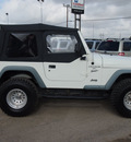 jeep wrangler 1999 white suv sport gasoline 6 cylinders 4 wheel drive 5 speed manual 78064