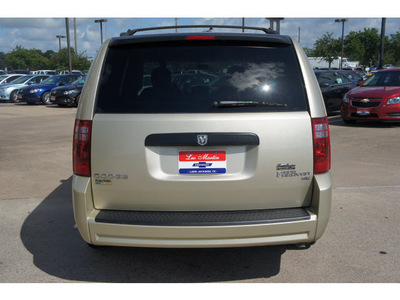 dodge grand caravan 2010 gold van se gasoline 6 cylinders front wheel drive shiftable automatic 77566