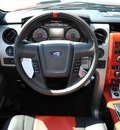 ford f 150 2011 orange svt raptor gasoline 8 cylinders 4 wheel drive automatic 76011