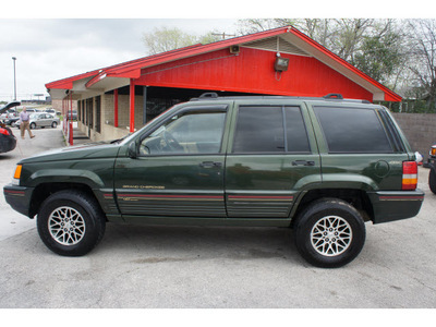 jeep grand cherokee 1995 green suv orvis gasoline 8 cylinders 4 wheel drive automatic 76543