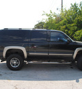 chevrolet suburban 2003 black suv gasoline 8 cylinders 4 wheel drive 4 speed automatic 75062